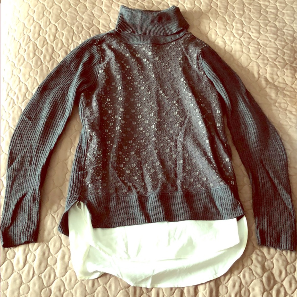 Grey sweater with white underlay